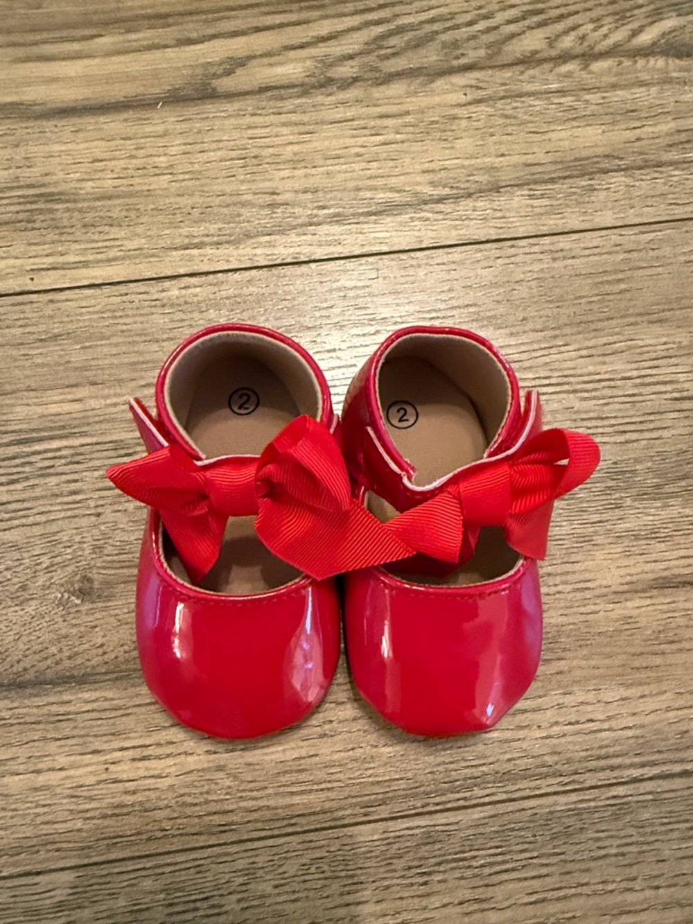 Baby red bow slippers